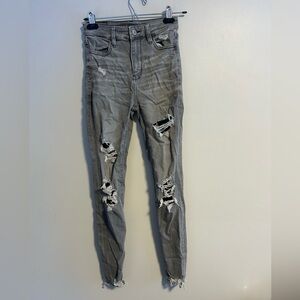 American eagle women’s 0 Distressed Gray denim super high rise skinny Jeans
